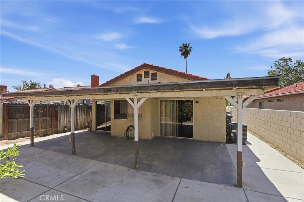 1907 Overland Street Colton, CA 92324 - Photo 29 of 36 a view of a house with a outdoor space