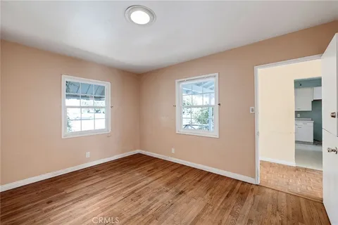 a swimming pool with outdoor seating