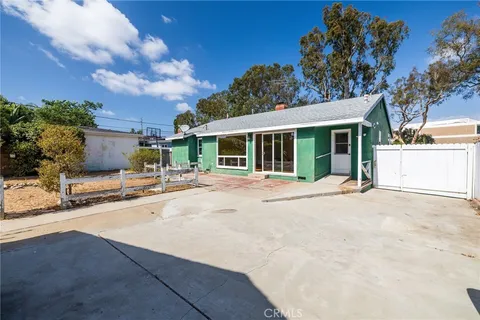 a view of a room with wooden walls