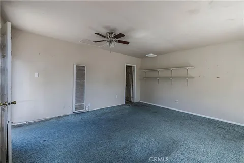 a view of a room that has a window in it