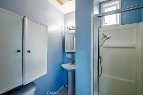 a kitchen with a stove and a sink