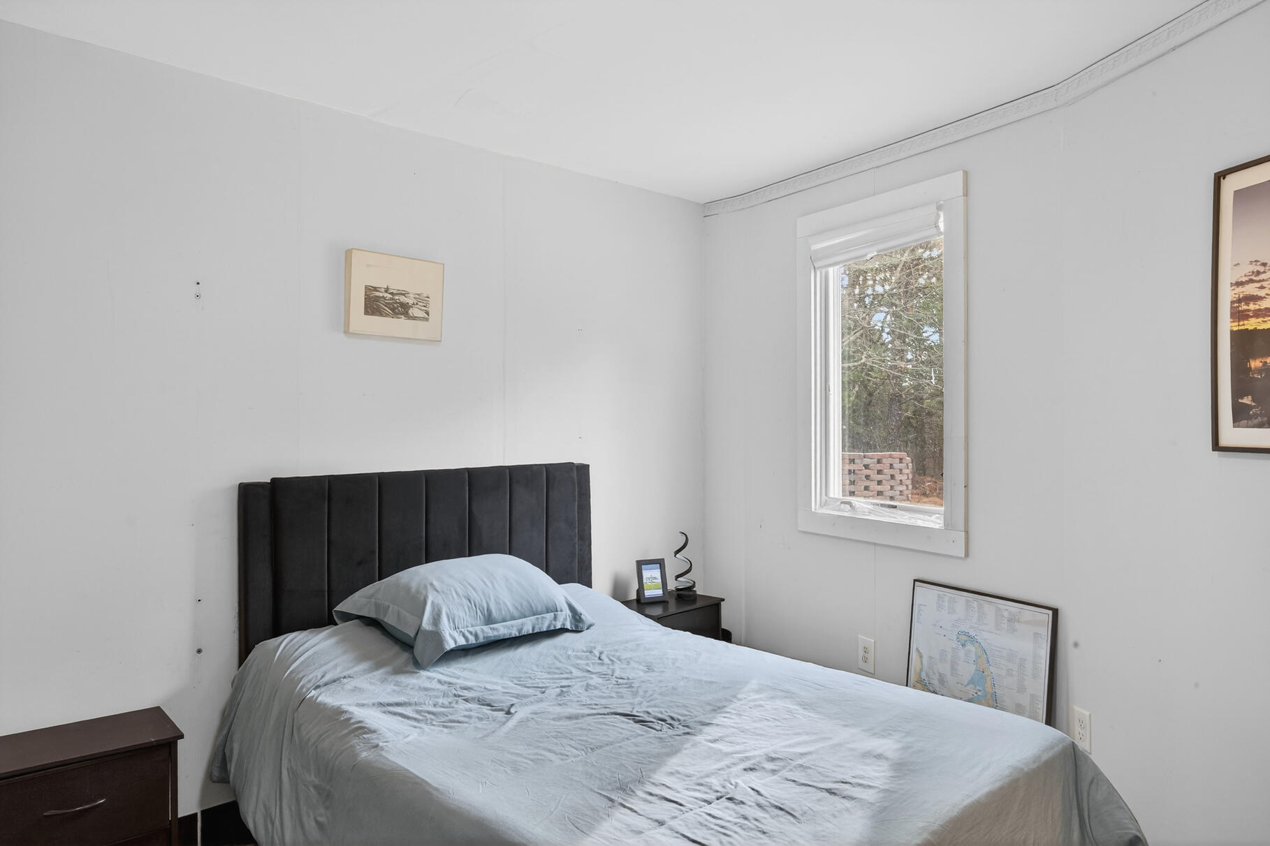 19 Old Bridge Road Truro, MA 02666 - Photo 13 of 27 a bedroom with a bed and a window