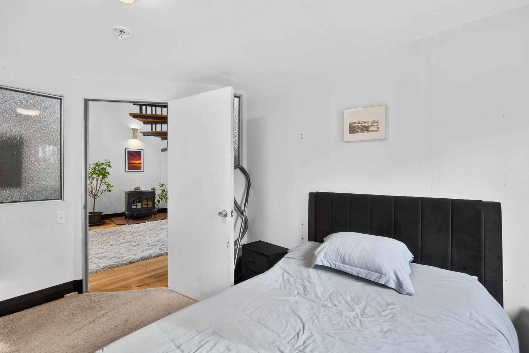 19 Old Bridge Road Truro, MA 02666 - Photo 14 of 27 a bedroom with a bed and a couch