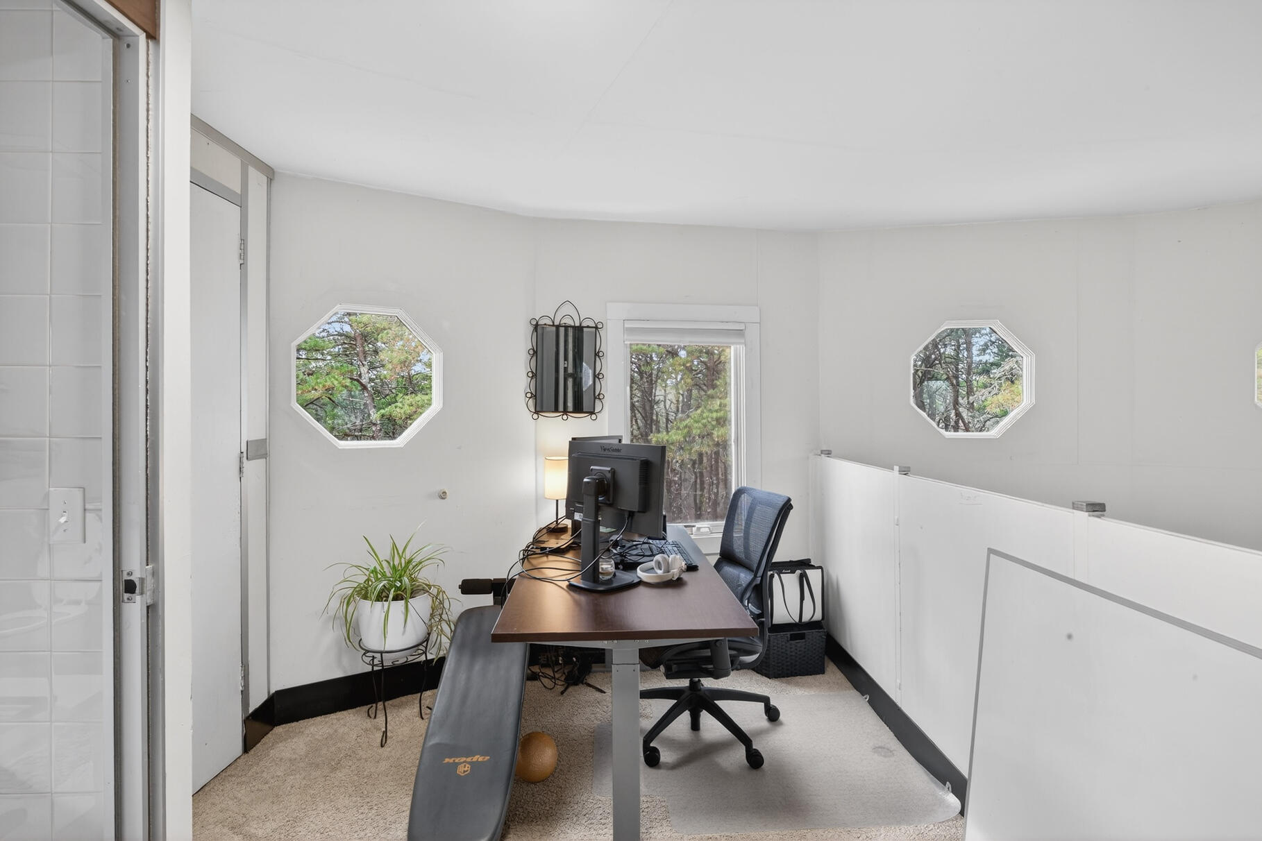 19 Old Bridge Road Truro, MA 02666 - Photo 17 of 27 a view of a workspace with a table and a chair