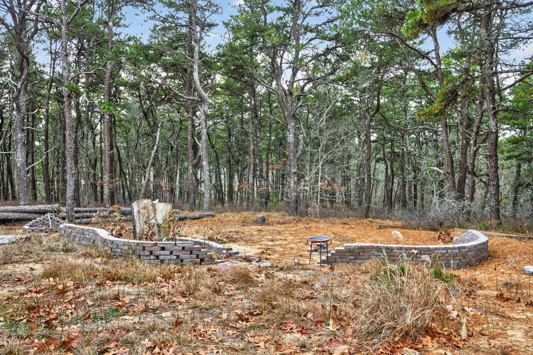 19 Old Bridge Road Truro, MA 02666 - Photo 25 of 27 a backyard of a house with barbeque oven