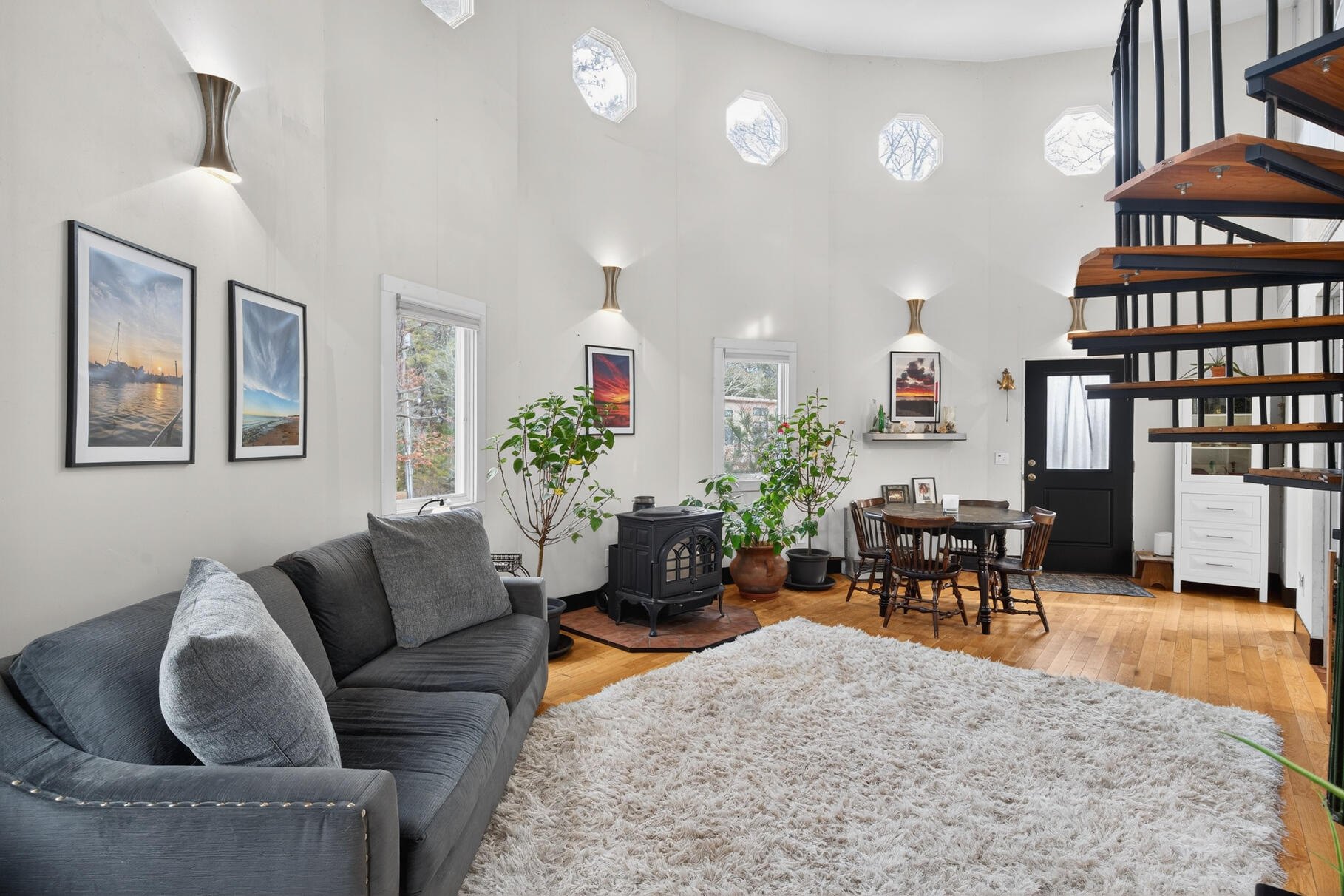 19 Old Bridge Road Truro, MA 02666 - Photo 5 of 27 a living room with furniture a piano and a bookshelf