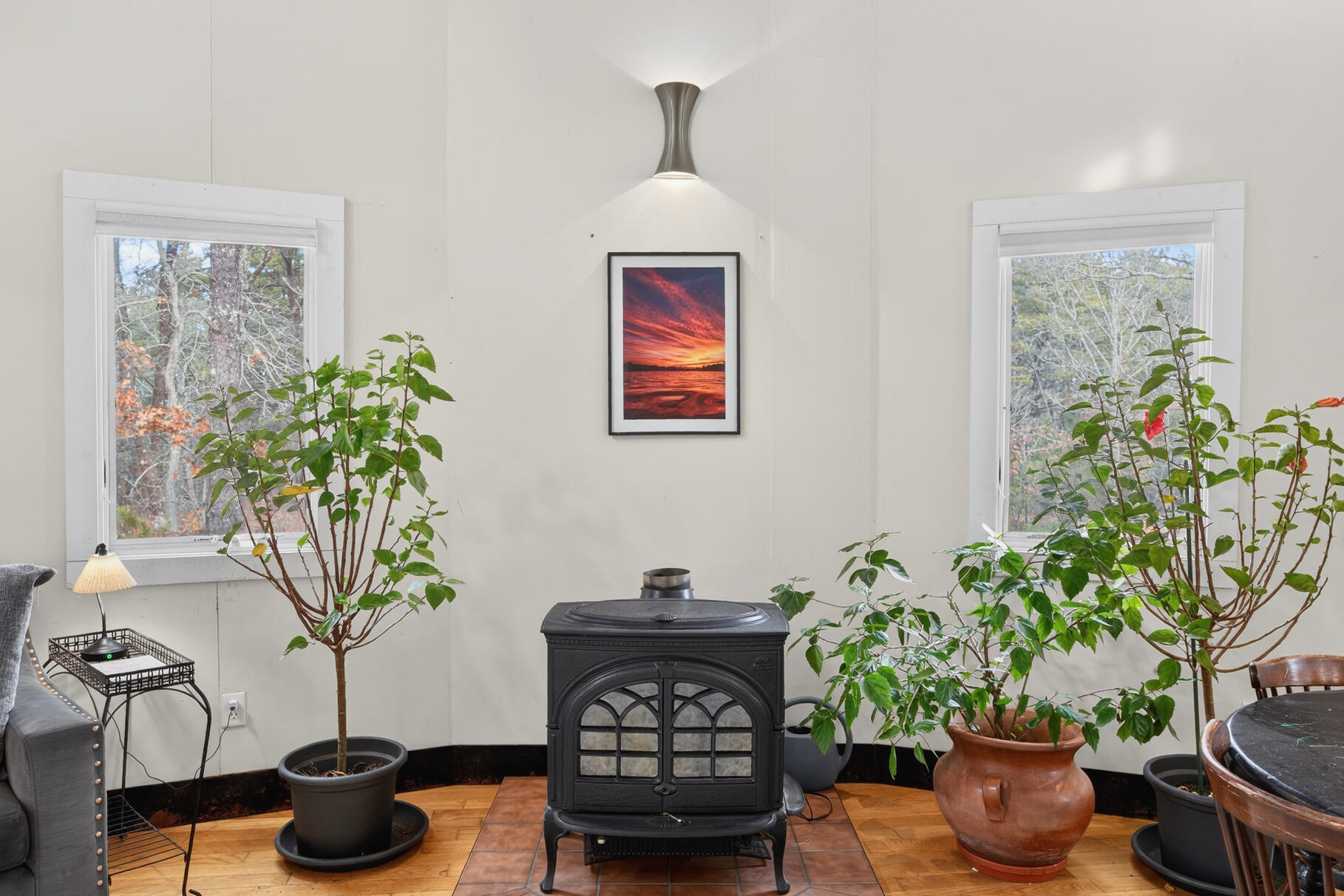 19 Old Bridge Road Truro, MA 02666 - Photo 7 of 27 a vase of flowers sitting on a table and a potted plant