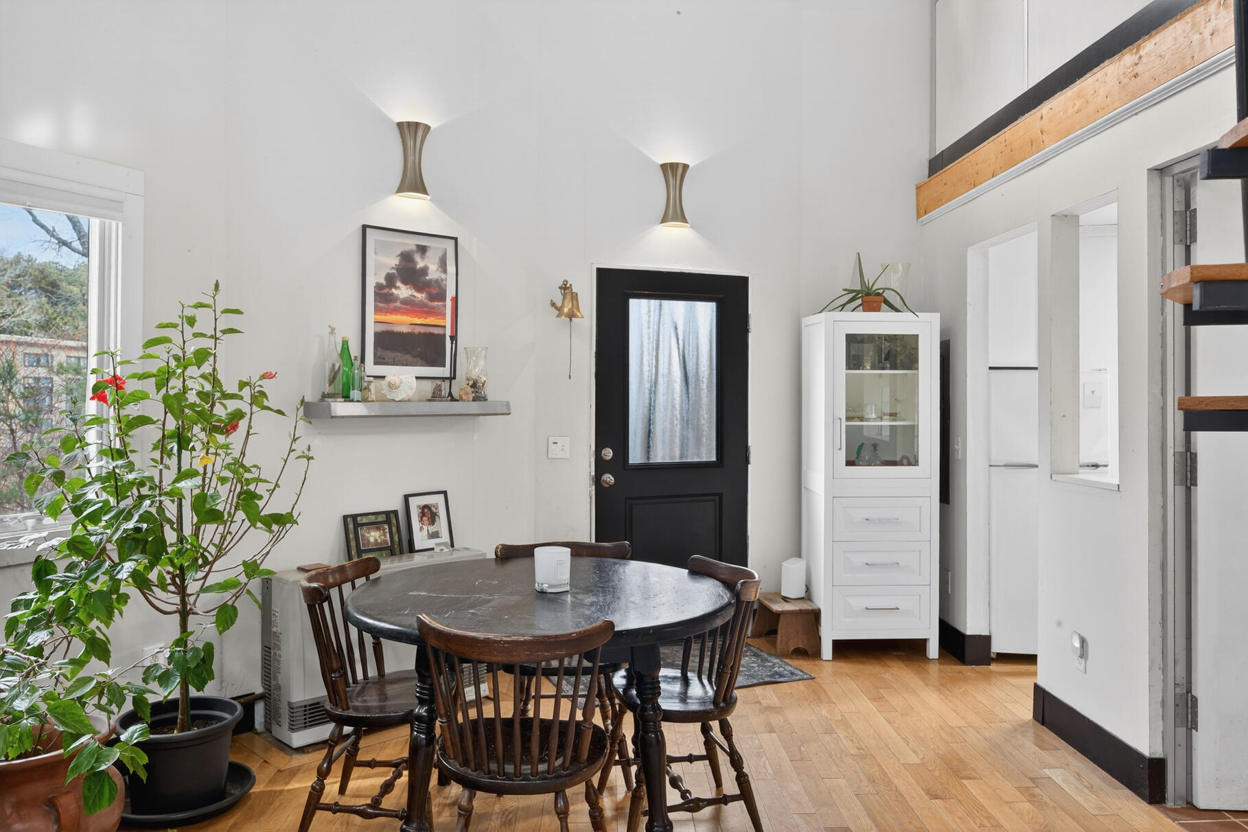 19 Old Bridge Road Truro, MA 02666 - Photo 8 of 27 a view of a dining room with furniture and wooden floor