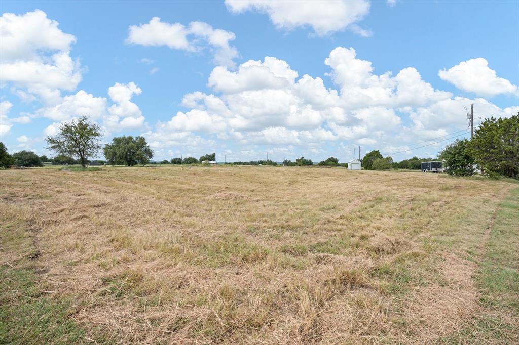 Tbd Ronald Road Glen Rose, TX 76043 - Photo 7 of 8 a view of a lake and mountain in the back