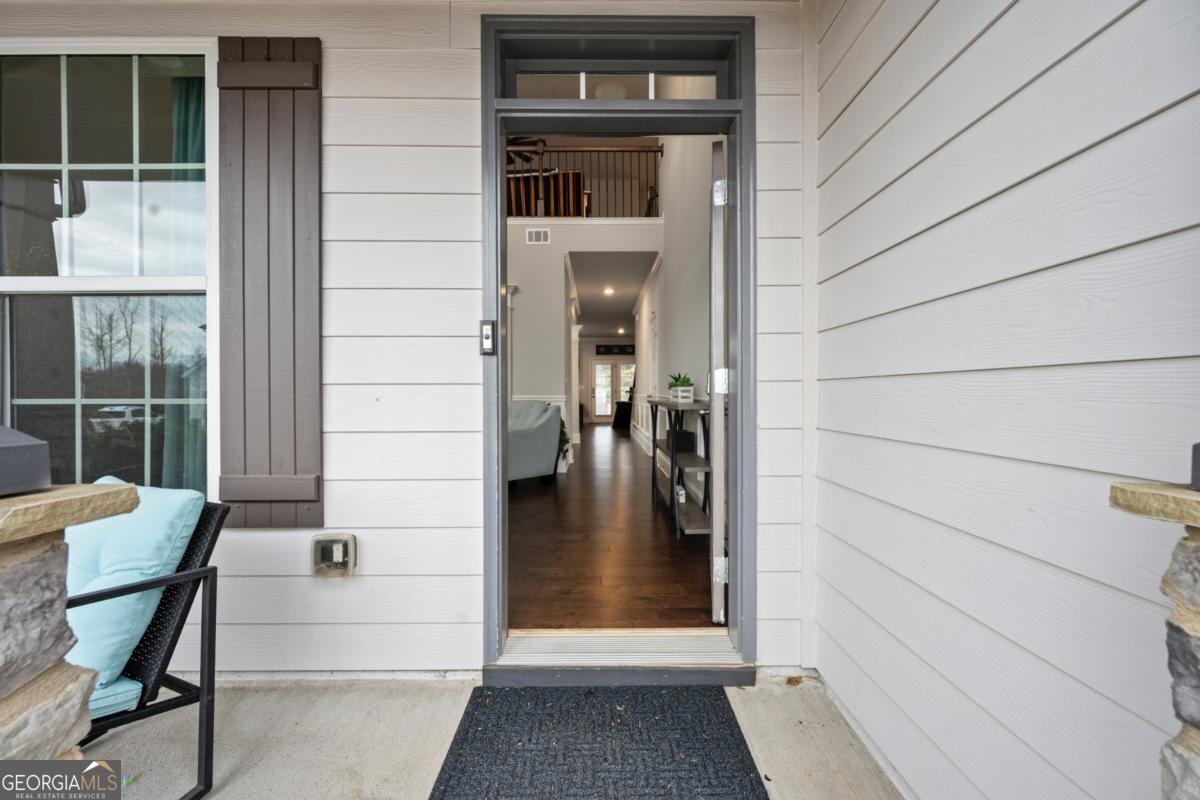 6780 Rambling Vale Dawsonville, GA 30534 - Photo 2 of 52 a view of balcony and patio