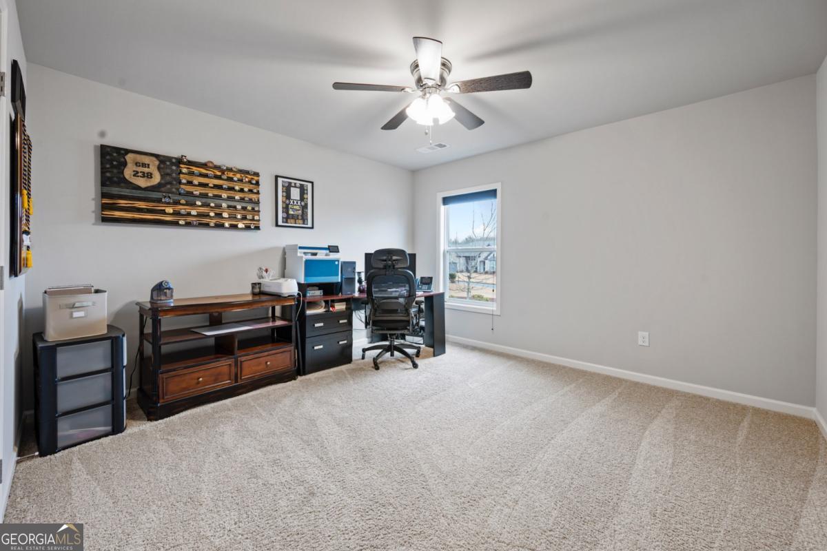 6780 Rambling Vale Dawsonville, GA 30534 - Photo 42 of 52 a view of a workspace with furniture