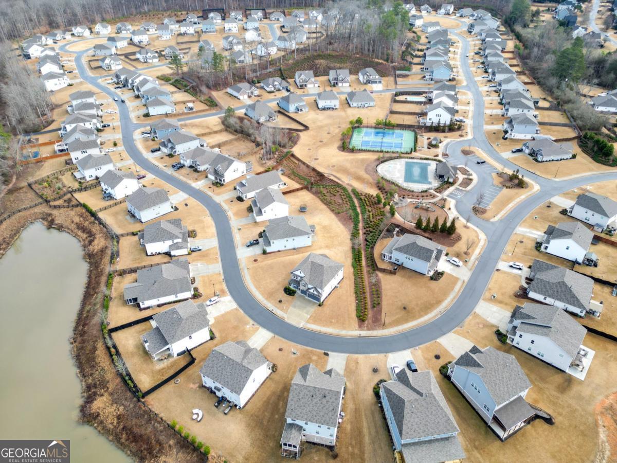 6780 Rambling Vale Dawsonville, GA 30534 - Photo 48 of 52 an aerial view of a swimming pool and outdoor space