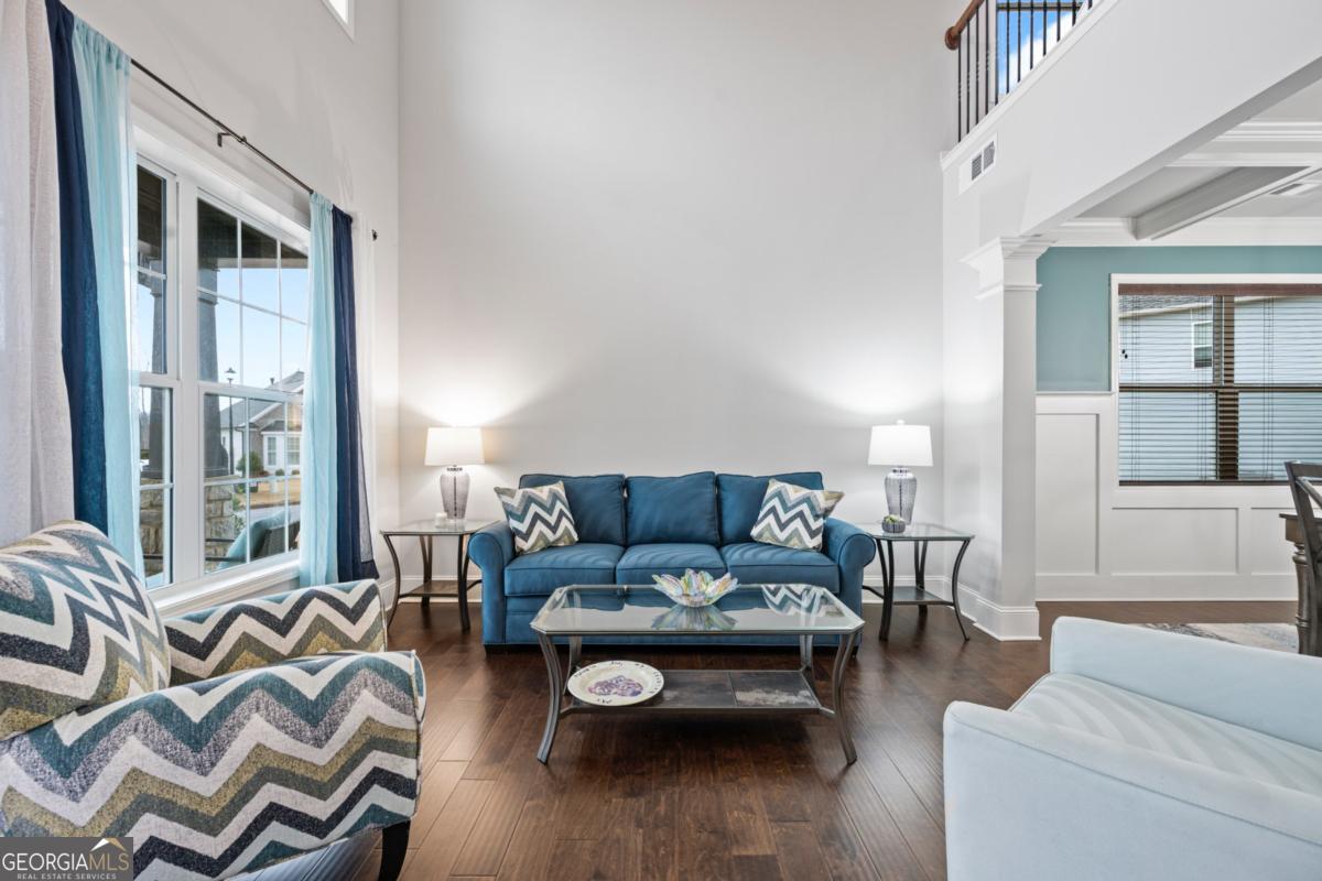 6780 Rambling Vale Dawsonville, GA 30534 - Photo 7 of 52 a living room with furniture and a window