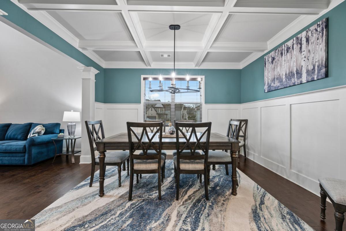 6780 Rambling Vale Dawsonville, GA 30534 - Photo 8 of 52 a view of a dining room with furniture window and wooden floor