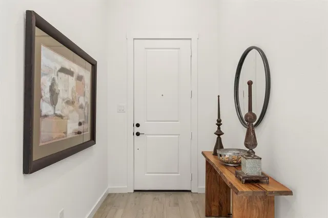 a view of a livingroom with a camera next to a window