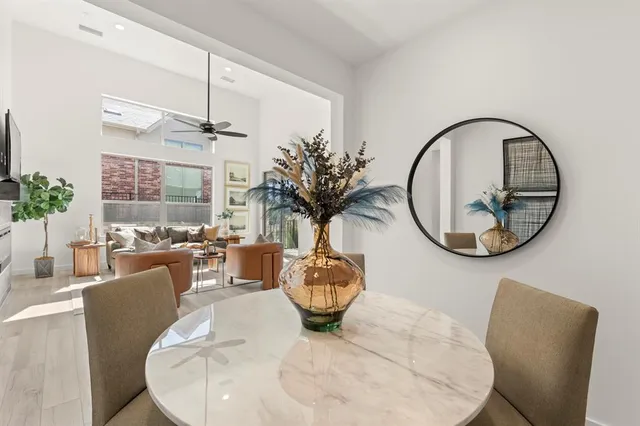 a view of a livingroom with furniture and a potted plant