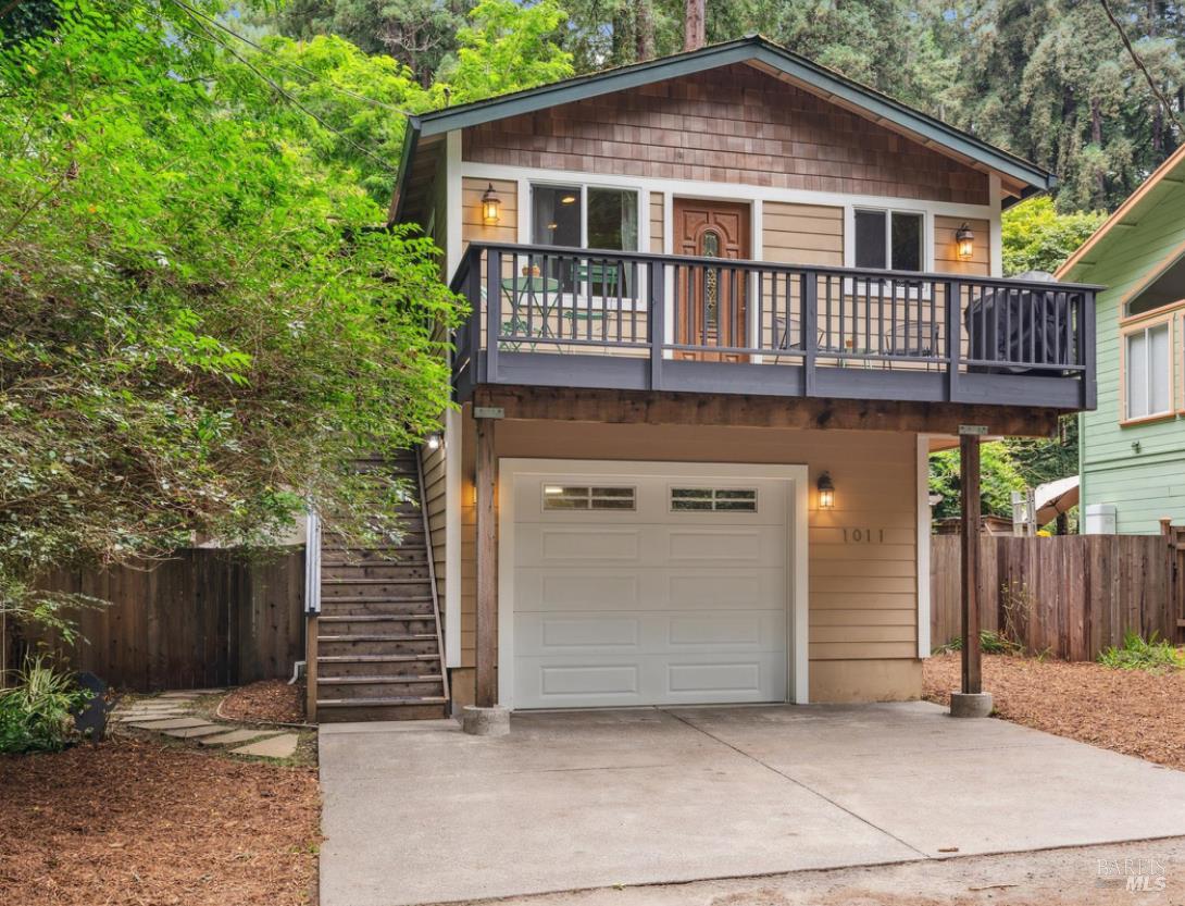 a front view of a house with a garage