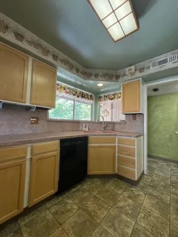 a close view of a refrigerator a stove and a microwave
