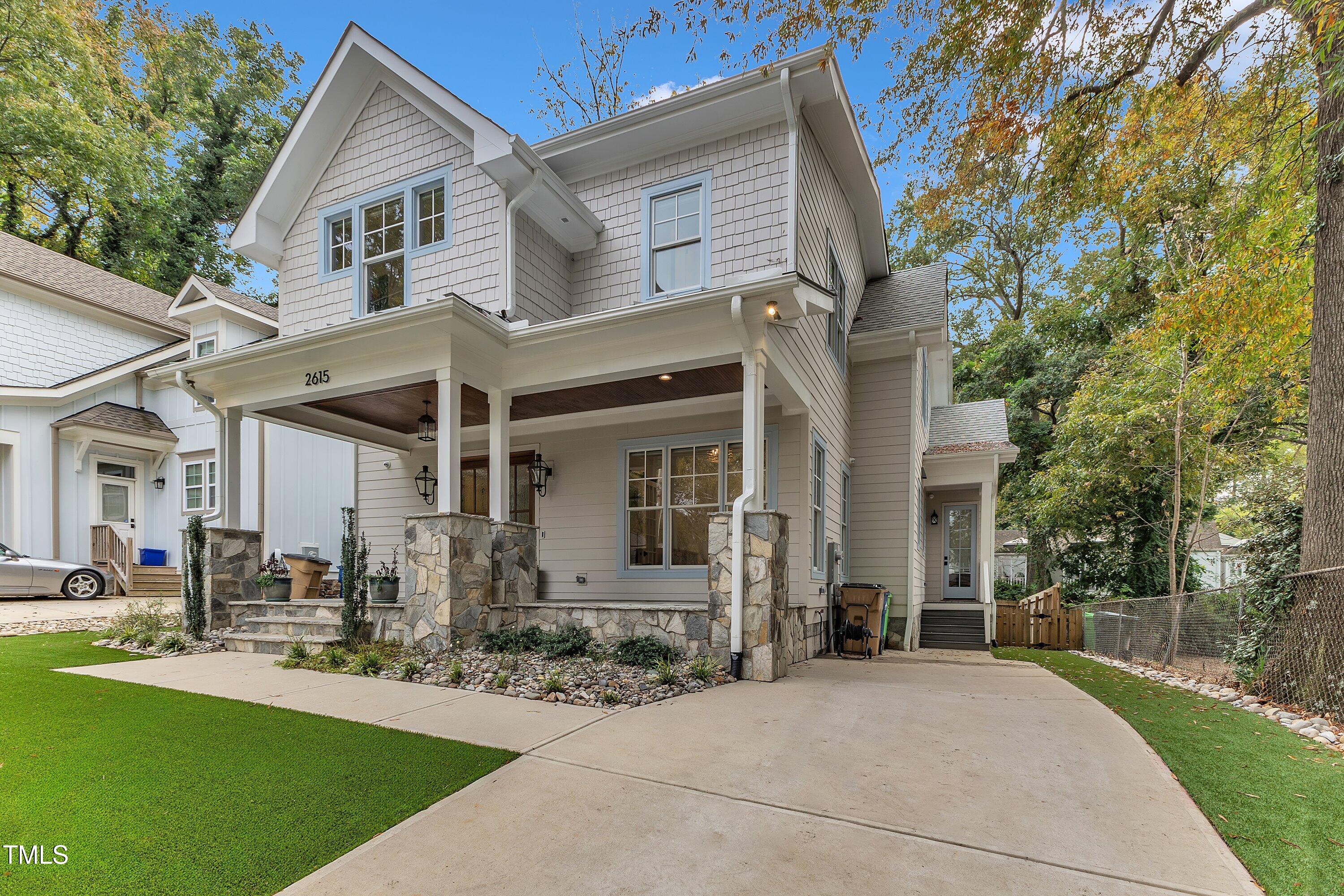 2615 Bedford Avenue Raleigh, NC 27607 - Photo 2 of 3 a front view of a house with a yard