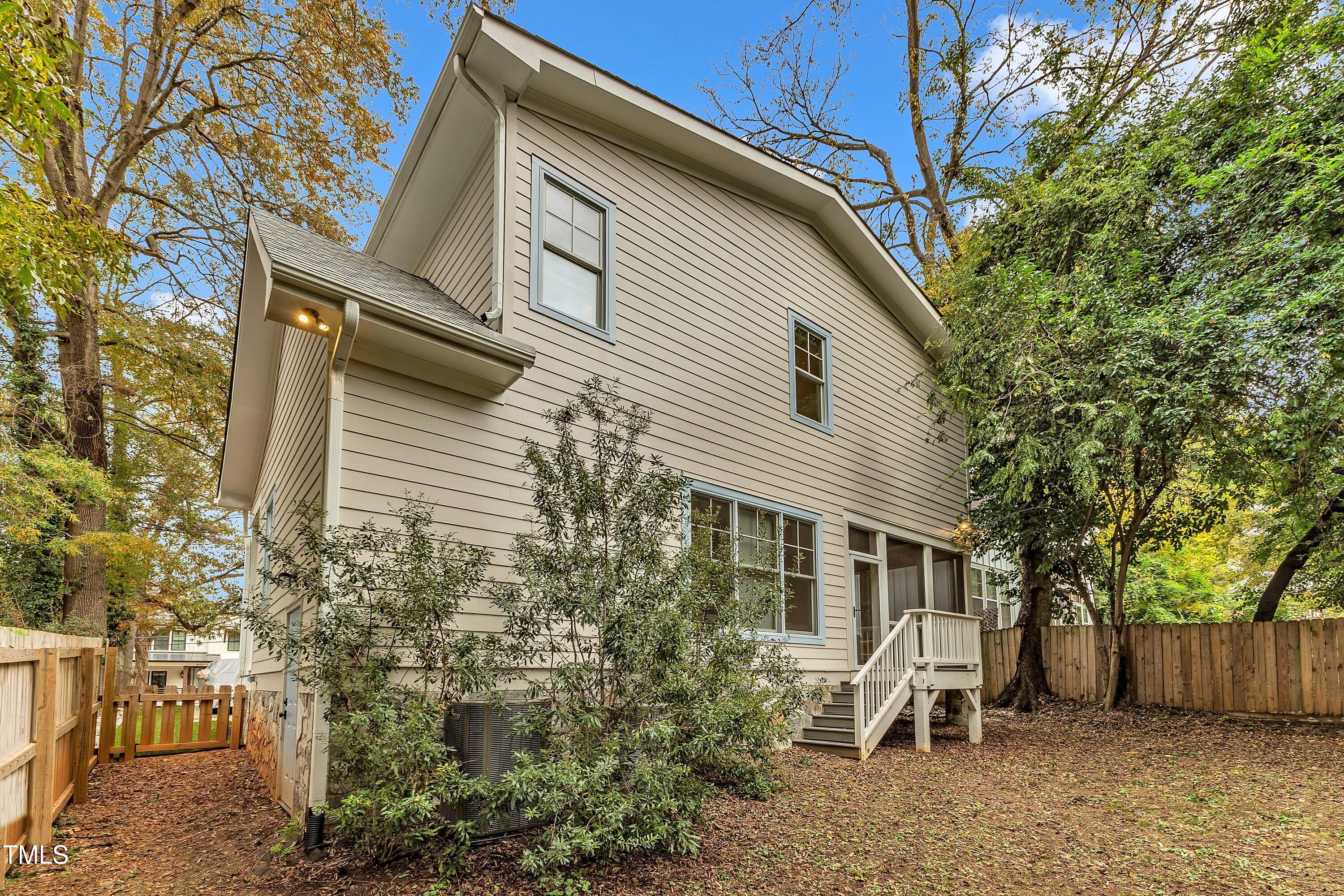 2615 Bedford Avenue Raleigh, NC 27607 - Photo 3 of 3 a view of a house with a yard