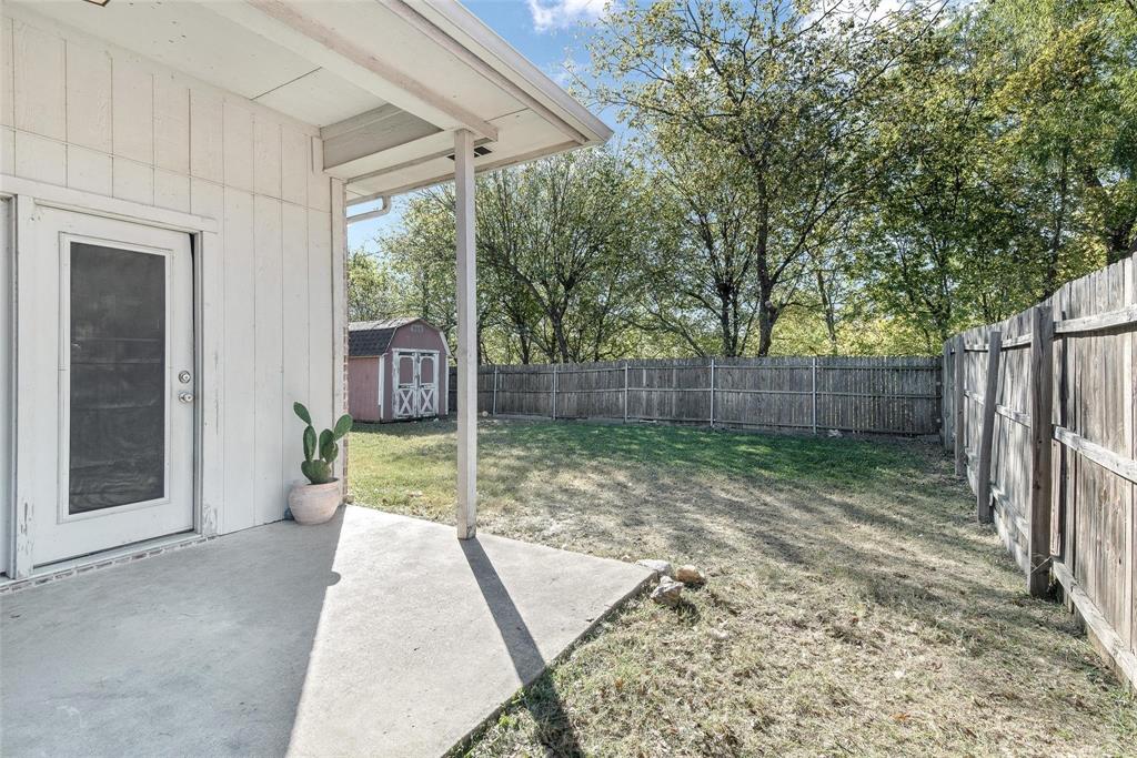 1764 Independence Road Blue Mound, TX 76131 - Photo 12 of 13 a garden view with a seating space