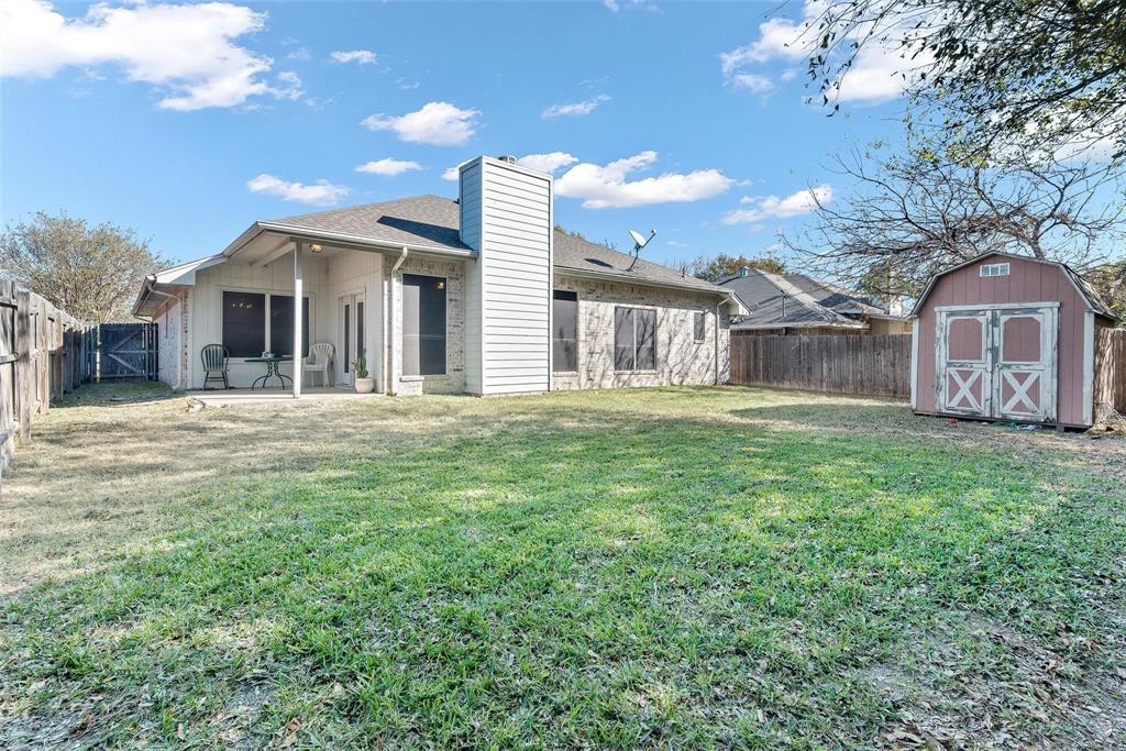 1764 Independence Road Blue Mound, TX 76131 - Photo 13 of 13 a large house with a big yard and large trees