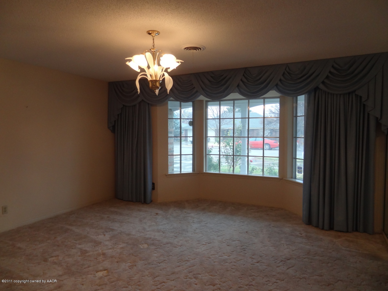 3308 Lombard Road Amarillo, TX 79106 - Photo 13 of 13 a view of an empty room with a window