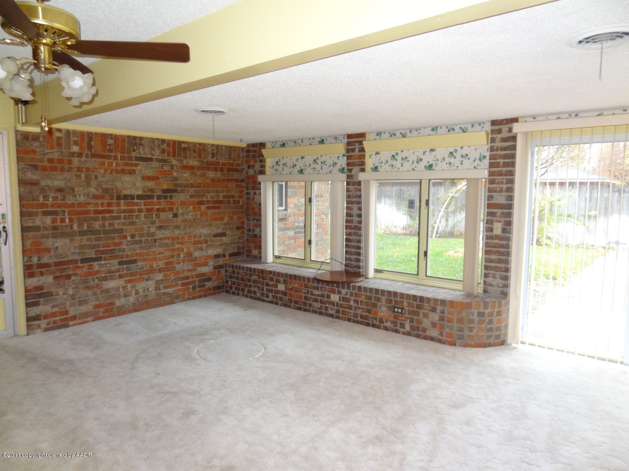 3308 Lombard Road Amarillo, TX 79106 - Photo 8 of 13 a view of an empty room with a window