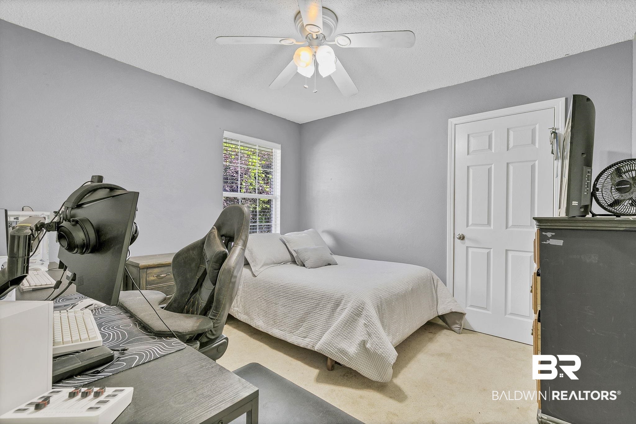 16358 Tempest Drive Foley, AL 36535 - Photo 29 of 46 Bedroom with light colored carpet, a ceiling fan, and a textured ceiling