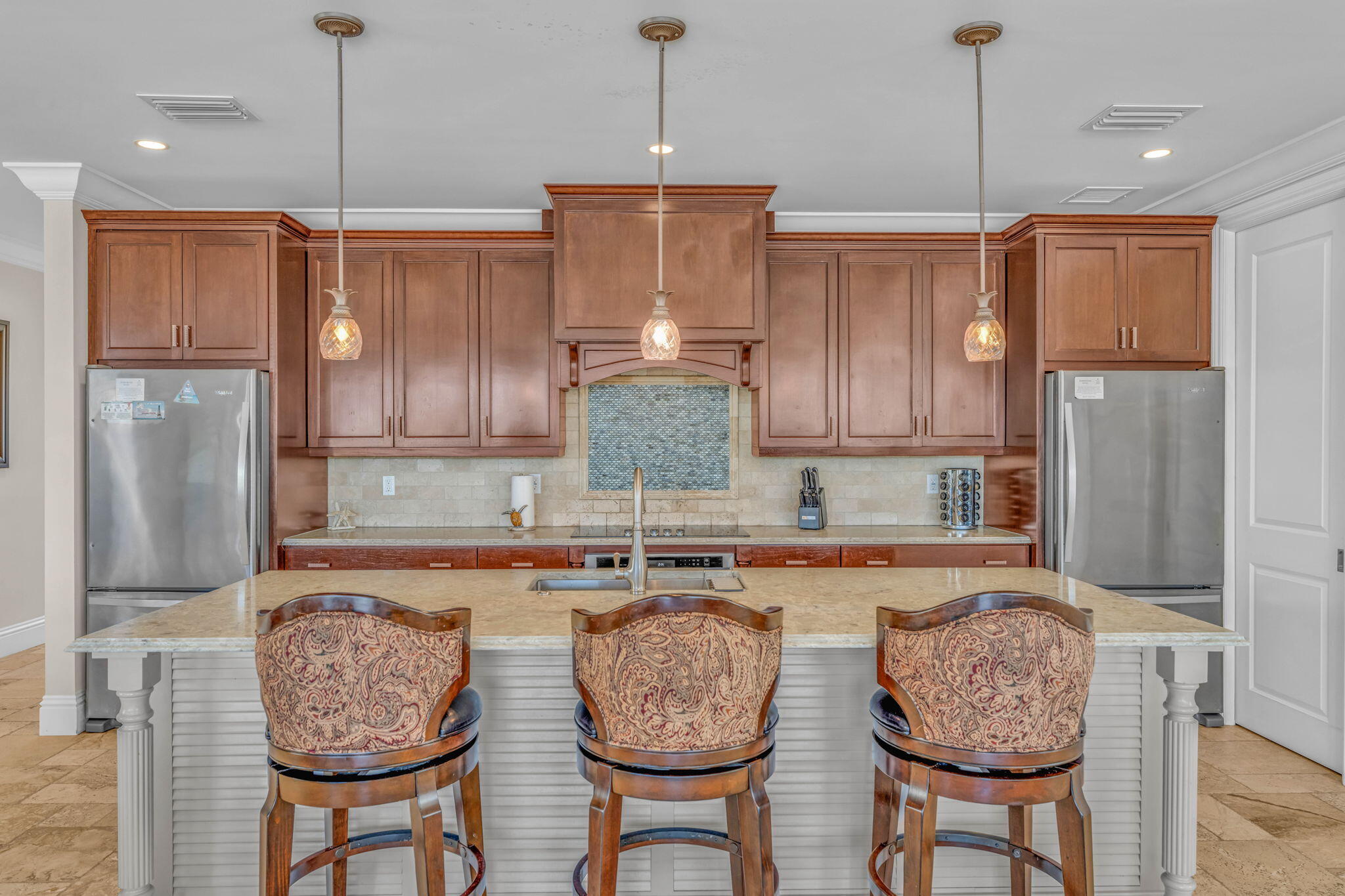 2394 Coco Plum Drive Marathon, FL 33050 - Photo 11 of 56 a kitchen with granite countertop cabinets and a dining table