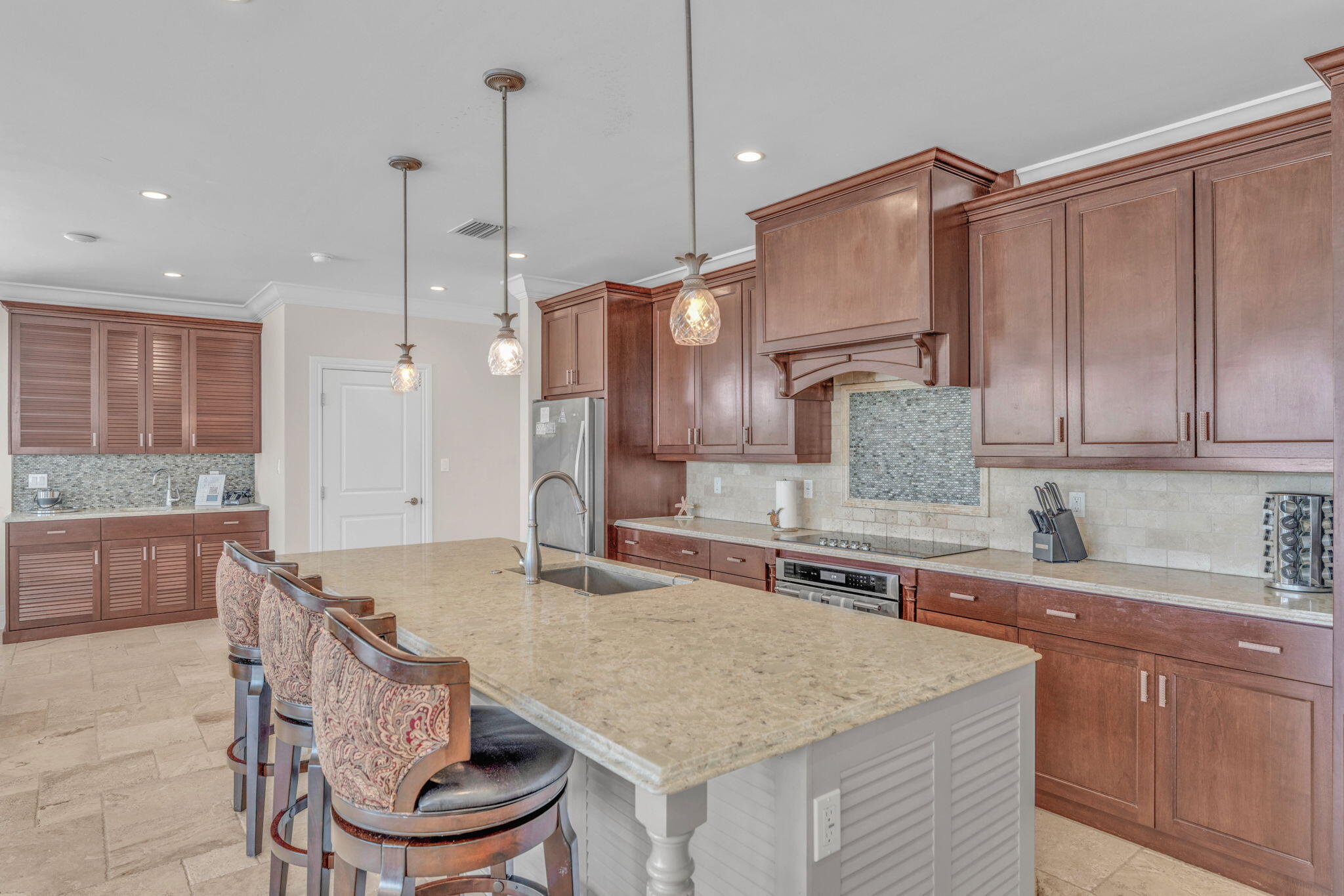 2394 Coco Plum Drive Marathon, FL 33050 - Photo 12 of 56 a kitchen with stainless steel appliances granite countertop a sink stove and refrigerator