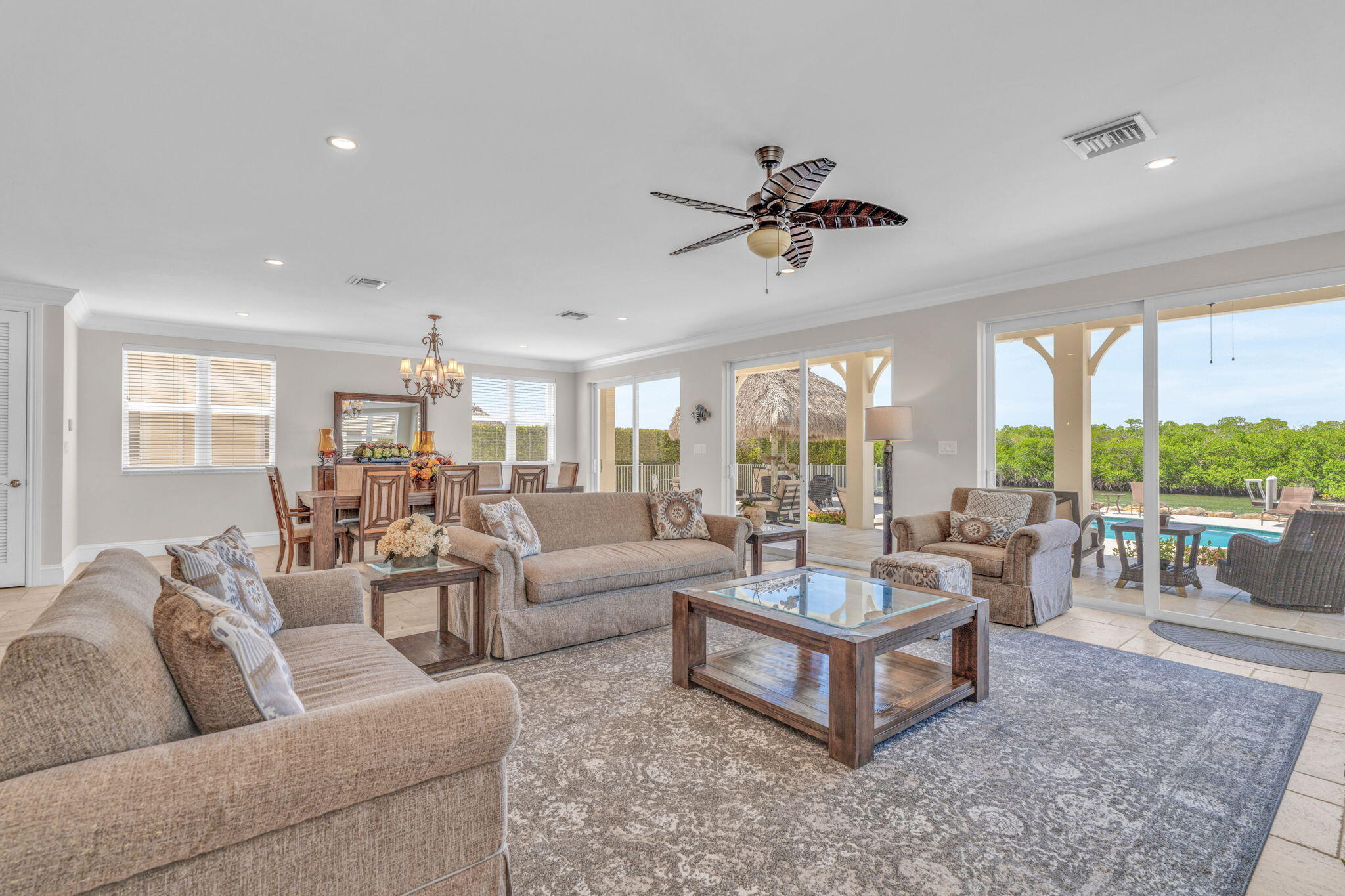 2394 Coco Plum Drive Marathon, FL 33050 - Photo 14 of 56 a living room with furniture a large window and a rug