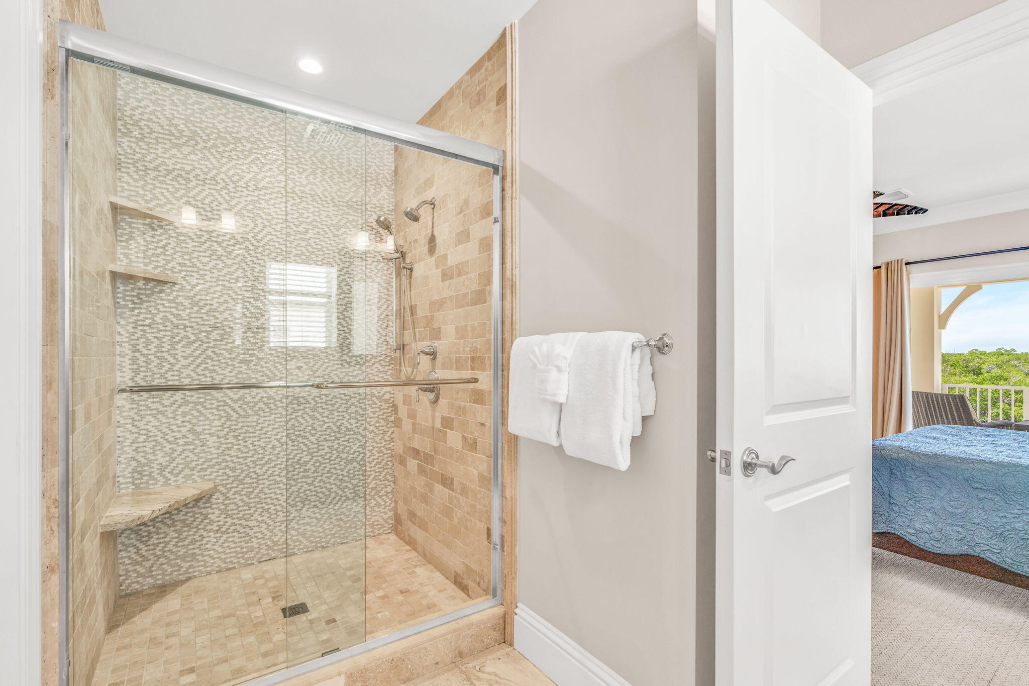 2394 Coco Plum Drive Marathon, FL 33050 - Photo 27 of 56 a bathroom with a glass shower door