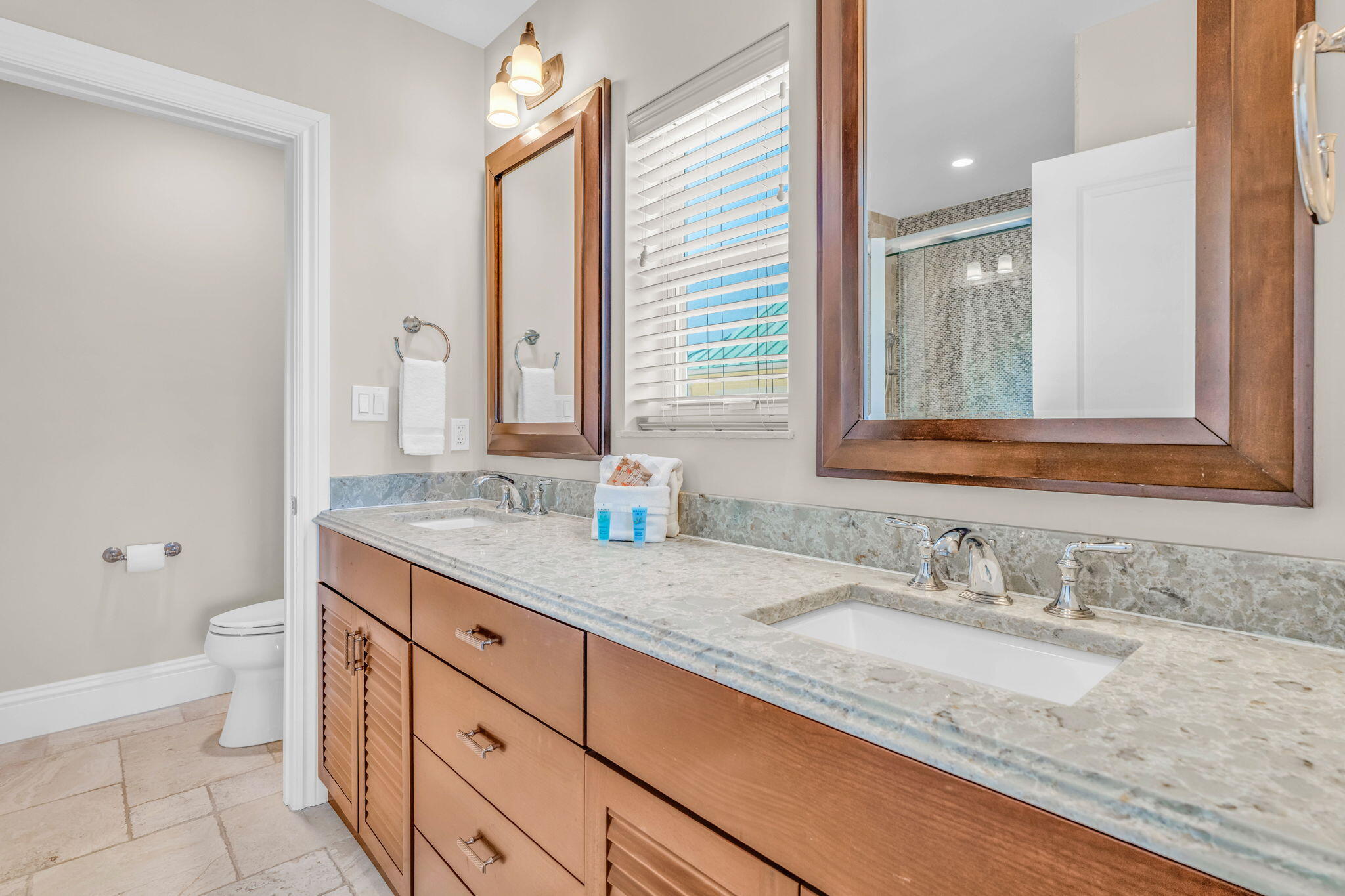 2394 Coco Plum Drive Marathon, FL 33050 - Photo 29 of 56 a bathroom with a granite countertop sink and a mirror