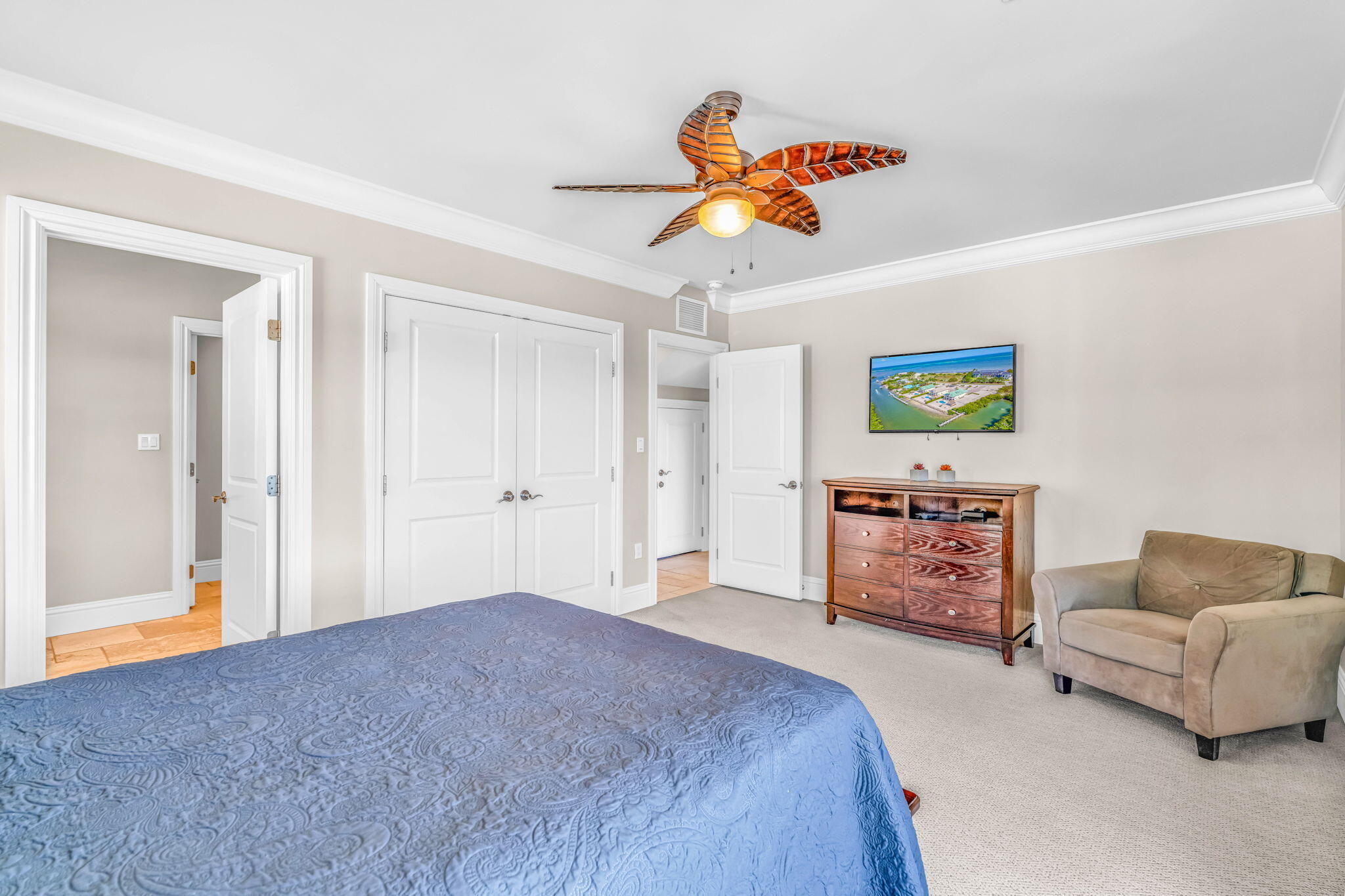 2394 Coco Plum Drive Marathon, FL 33050 - Photo 32 of 56 a bedroom with a bed and a couch