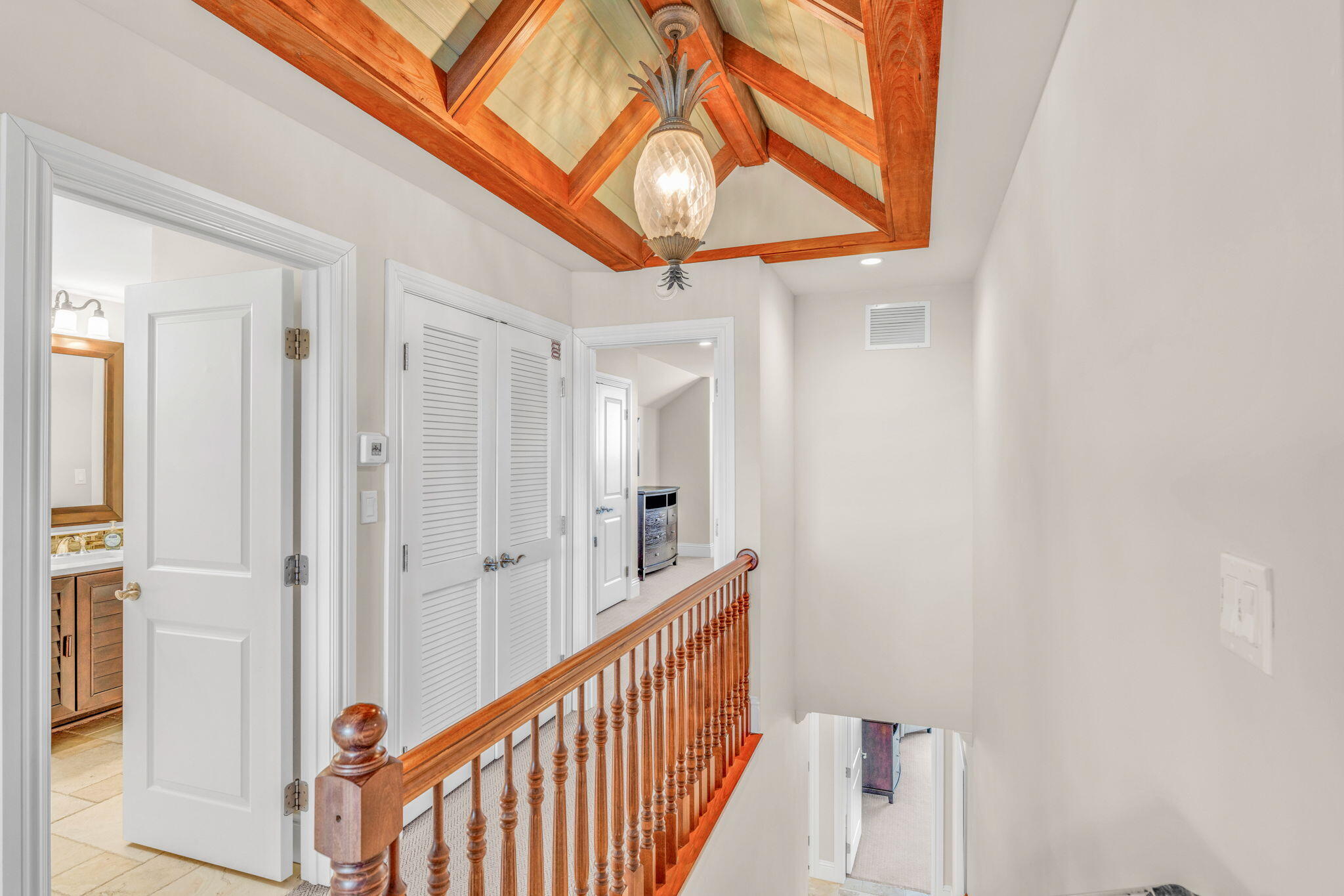 2394 Coco Plum Drive Marathon, FL 33050 - Photo 38 of 56 a view of a hallway with a chandelier