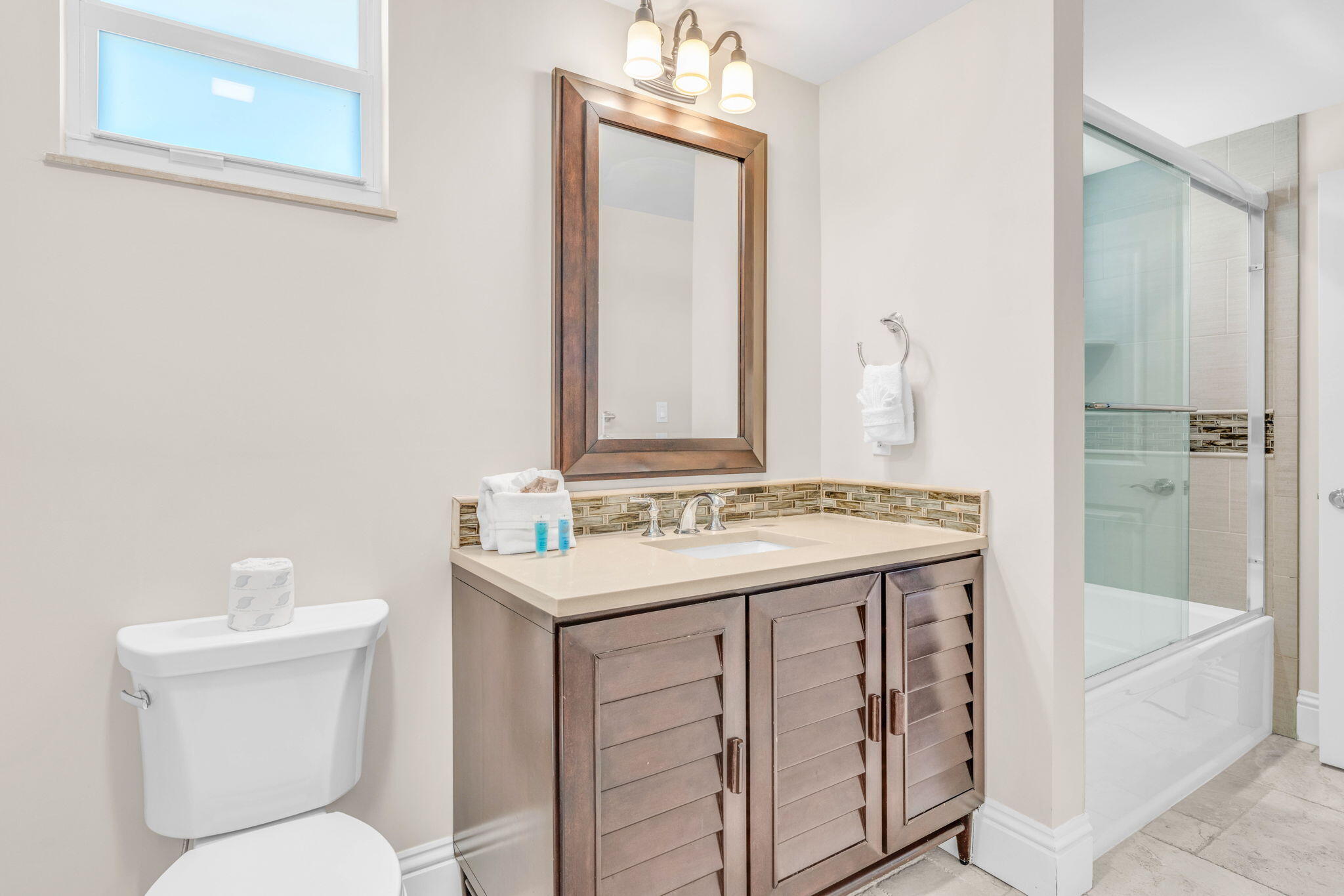 2394 Coco Plum Drive Marathon, FL 33050 - Photo 39 of 56 a bathroom with a sink a toilet and shower