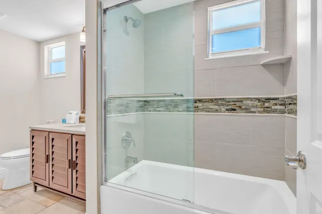 a view of balcony with furniture and garden