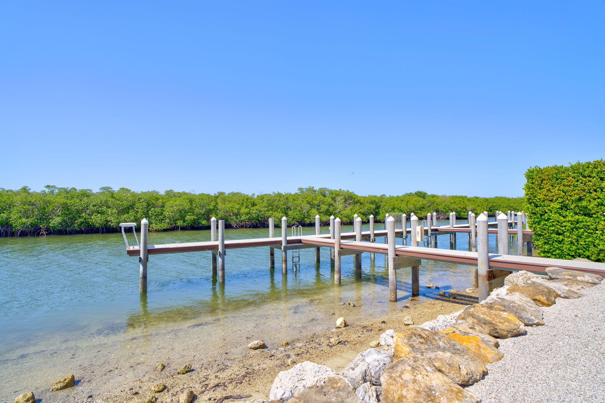 2394 Coco Plum Drive Marathon, FL 33050 - Photo 51 of 56 a view of a lake with a mountain view