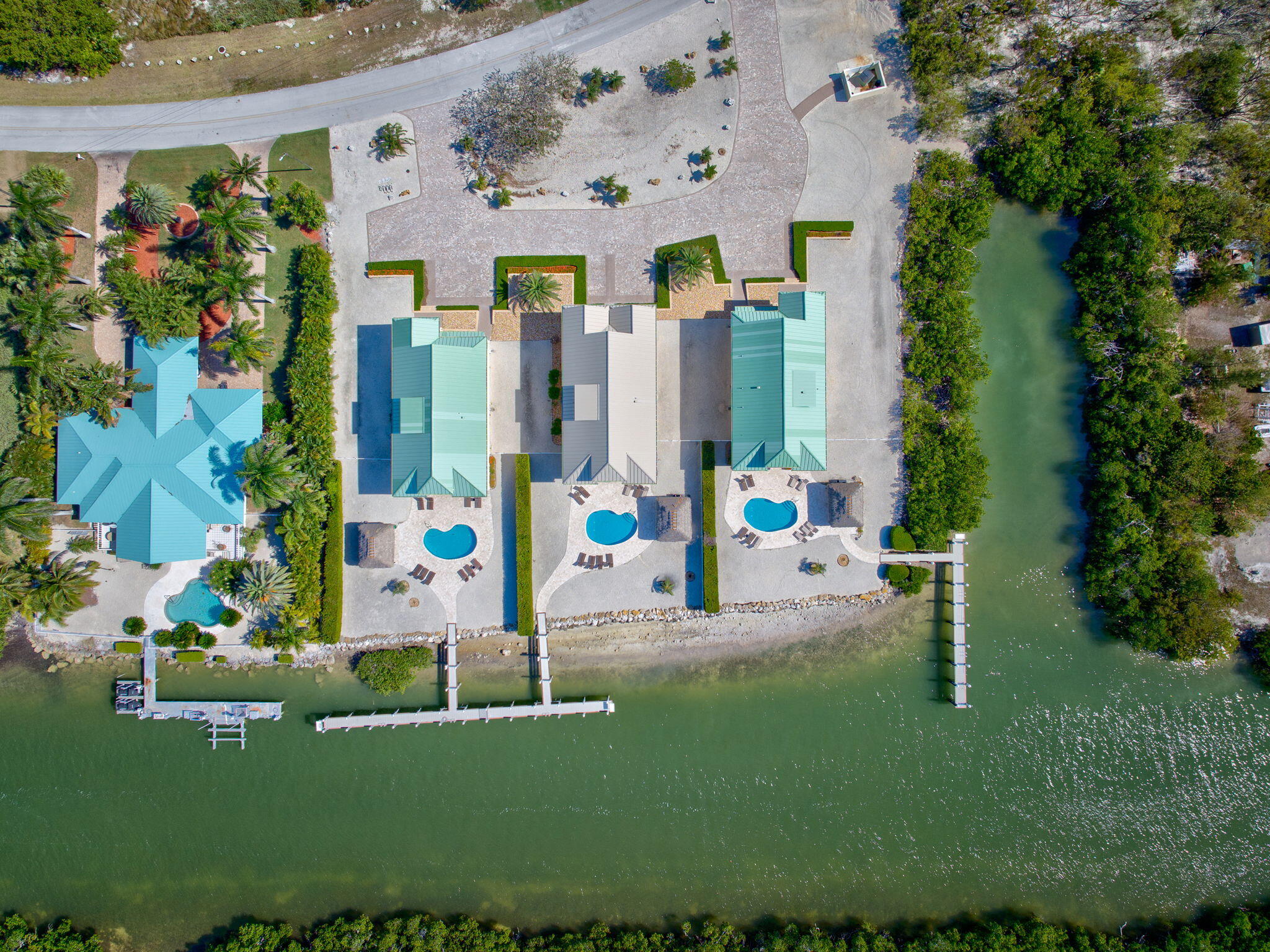 2394 Coco Plum Drive Marathon, FL 33050 - Photo 7 of 56 a front view of a house with garden