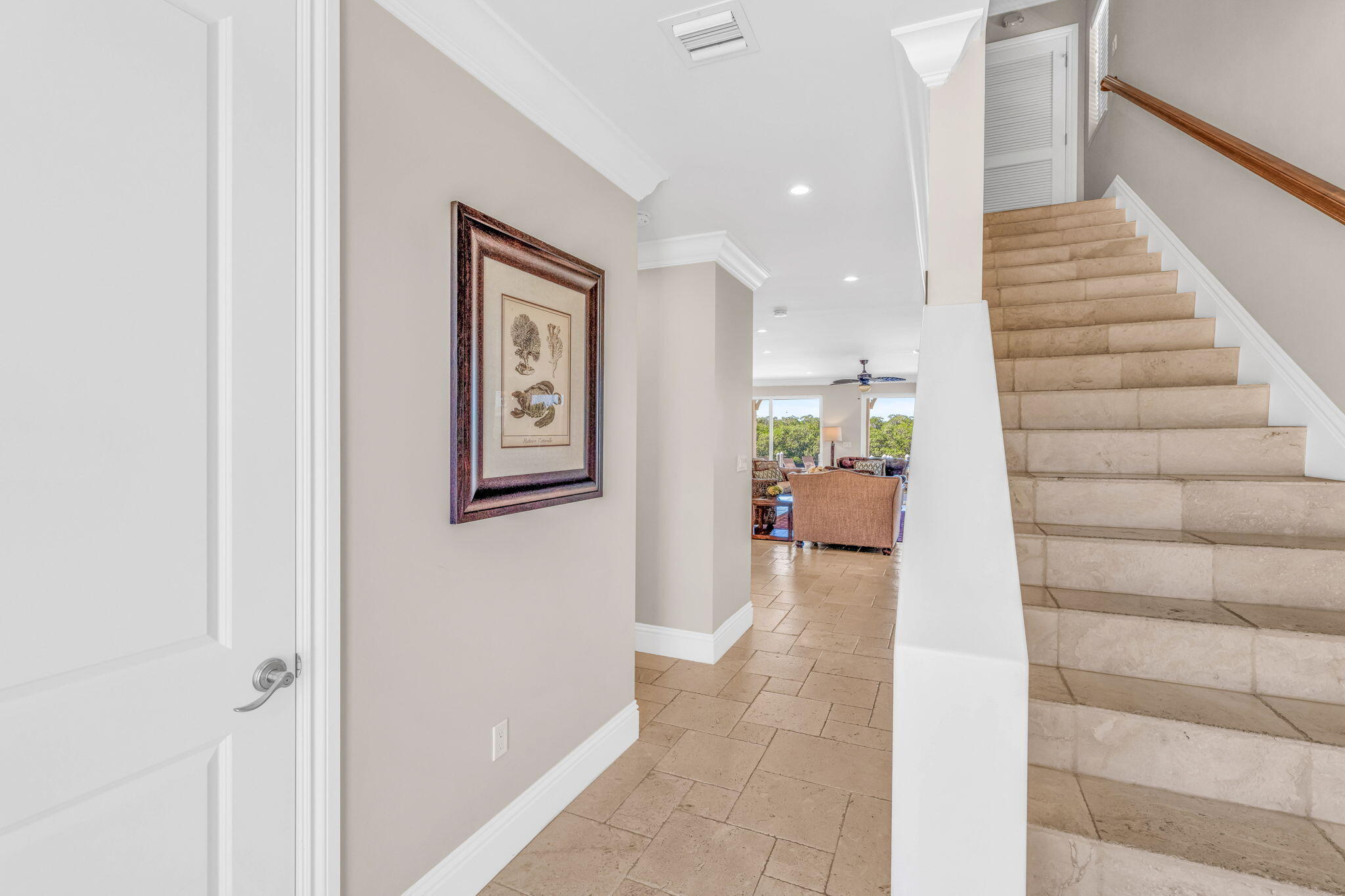 2394 Coco Plum Drive Marathon, FL 33050 - Photo 8 of 56 a view of a hallway with furniture and stairs