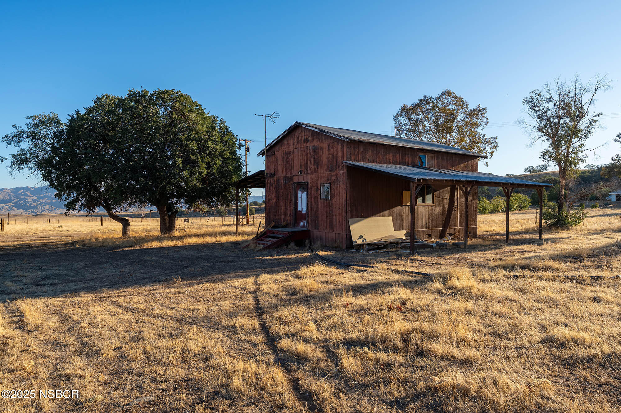 2170 Aliso Park Road New Cuyama, CA 93254 - Photo 17 of 71 a view of a house with wooden fence