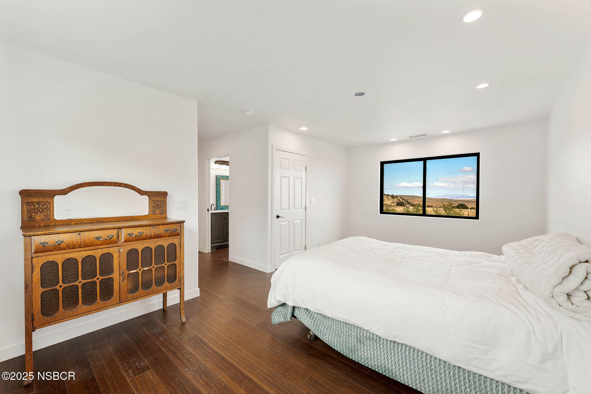 2170 Aliso Park Road New Cuyama, CA 93254 - Photo 9 of 71 a bedroom with a bed and a dresser