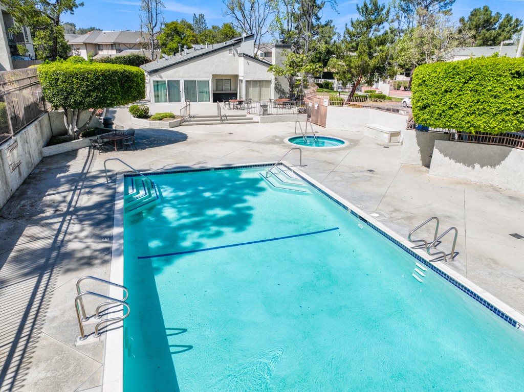 17068 Colima Road, Unit 274 Hacienda Heights, CA 91745 - Photo 11 of 14 a view of a yard with table and chairs with wooden fence