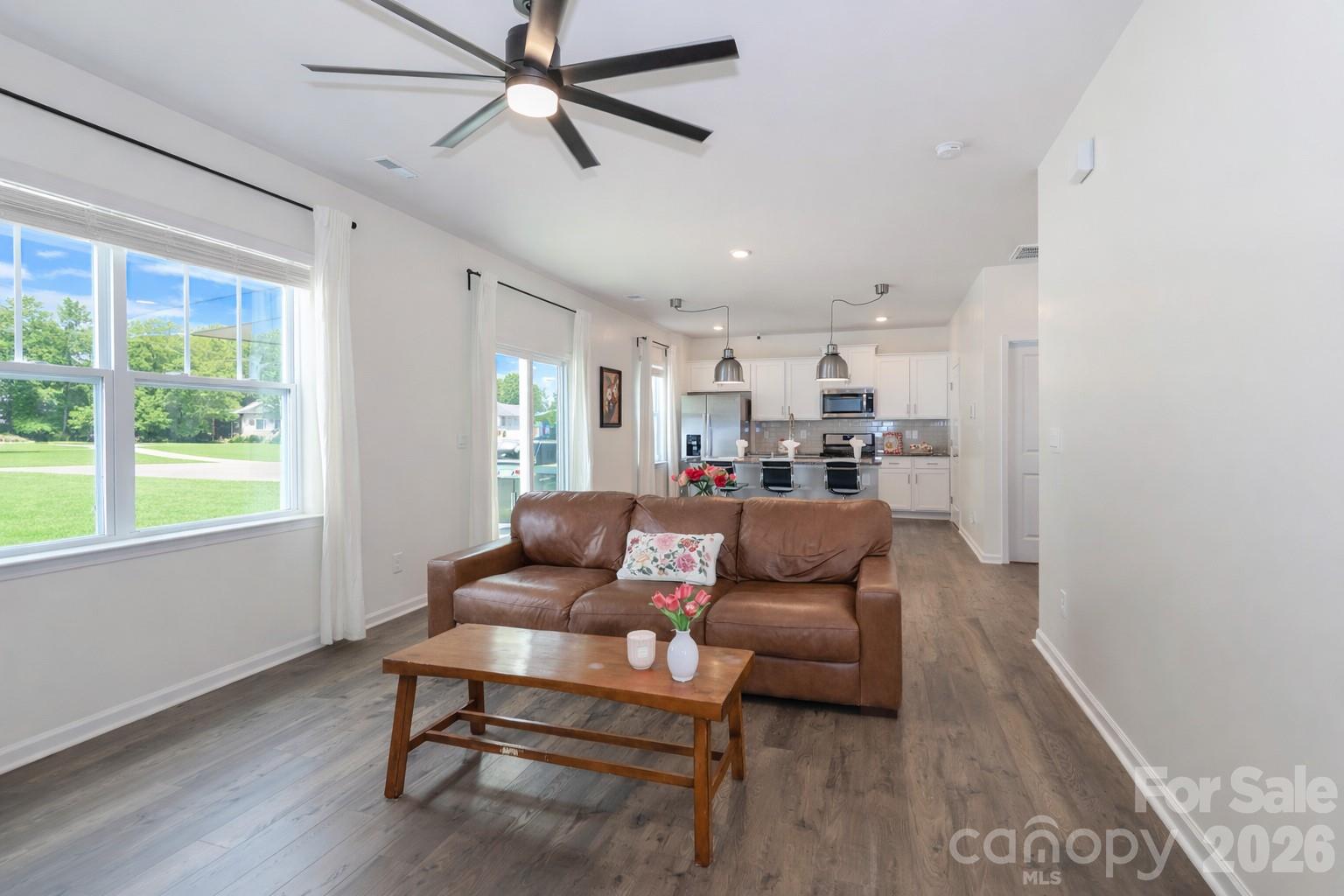 108 Kona Road, Unit 66 Mooresville, NC 28117 - Photo 23 of 47 a living room with furniture and a large window