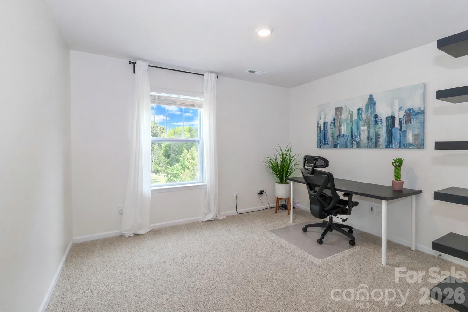 108 Kona Road, Unit 66 Mooresville, NC 28117 - Photo 25 of 47 a view of a workspace with furniture and a window