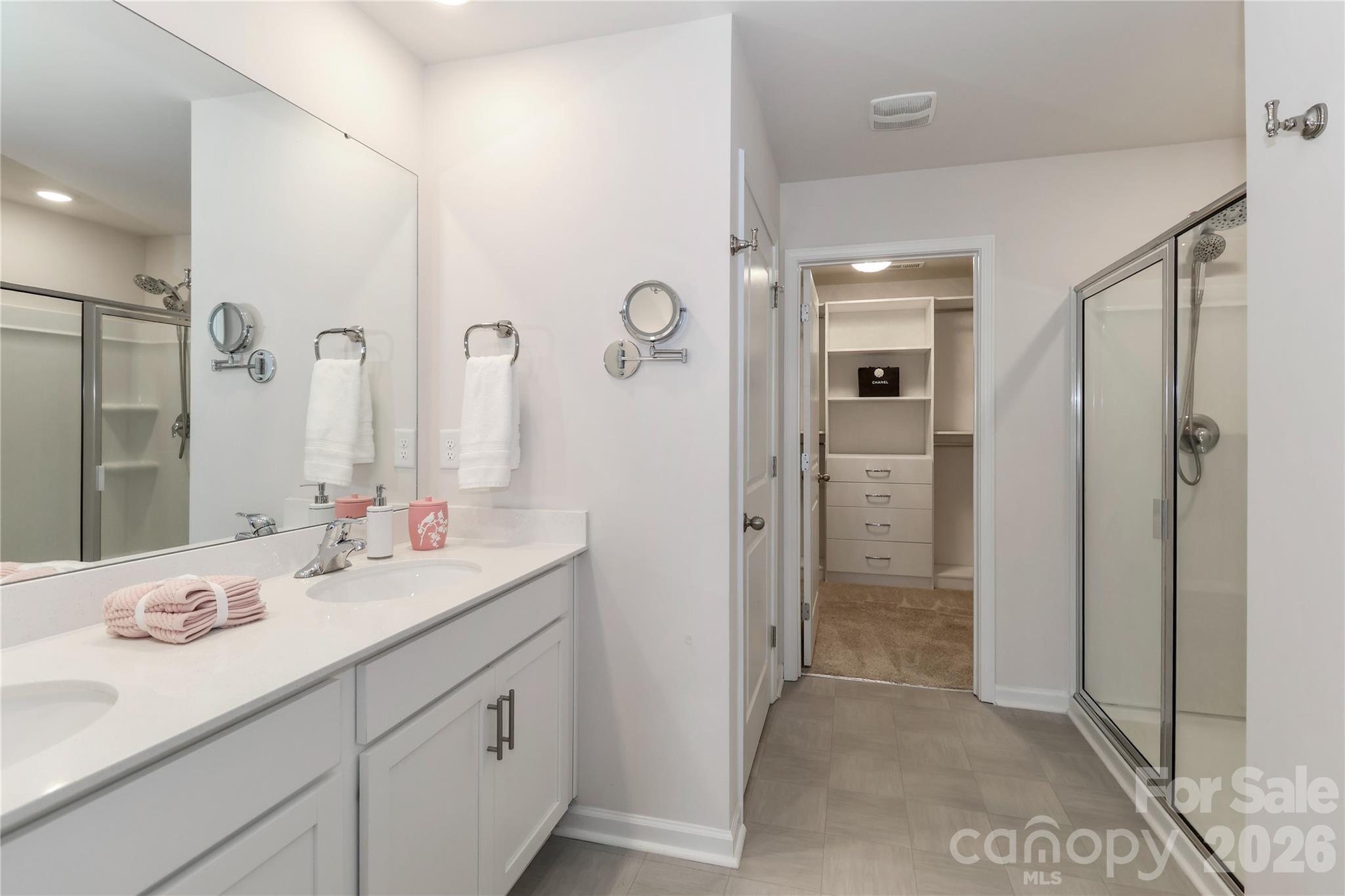 108 Kona Road, Unit 66 Mooresville, NC 28117 - Photo 29 of 47 a bathroom with a granite countertop sink shower and a mirror