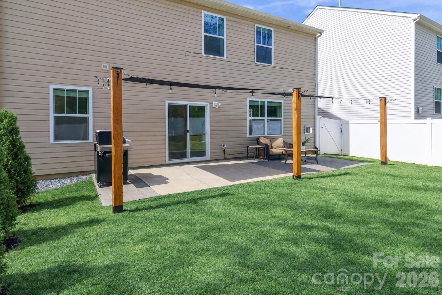 108 Kona Road, Unit 66 Mooresville, NC 28117 - Photo 42 of 47 a view of a house with backyard and a tree