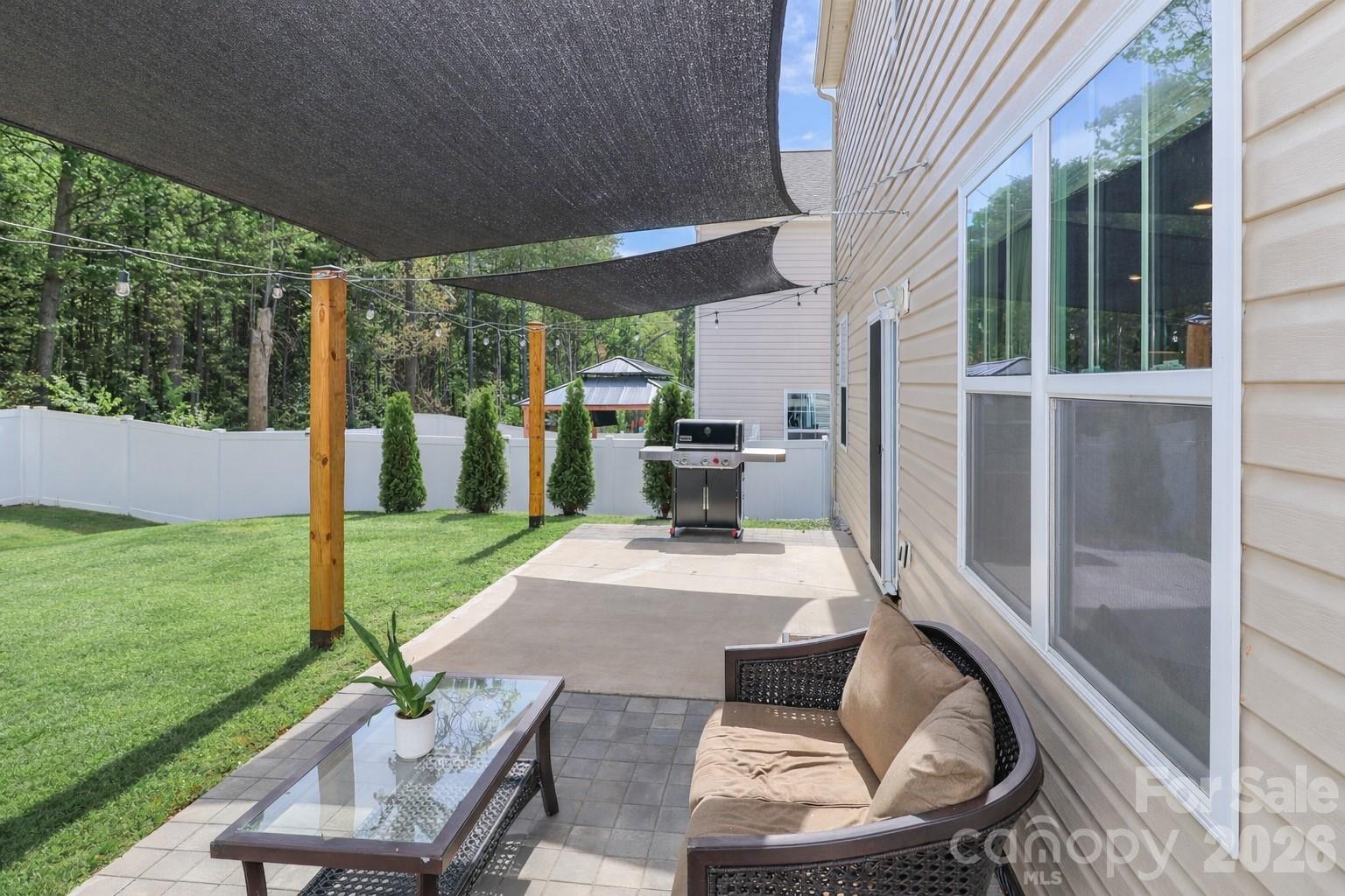 108 Kona Road, Unit 66 Mooresville, NC 28117 - Photo 44 of 47 a view of backyard of house with seating space