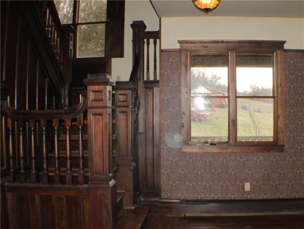 221 Ferguson Lane Perryopolis, PA 15473 - Photo 2 of 37 Enter into a nice sized foyer with original woodwork